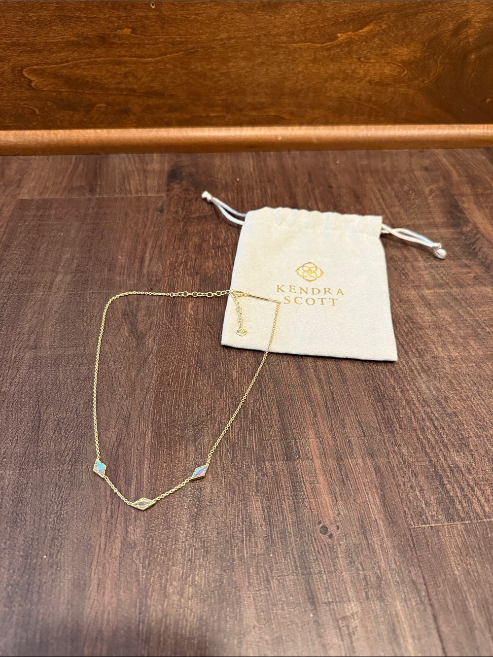 Kendra Scott Gold Necklace with Iridescent Opal Stone